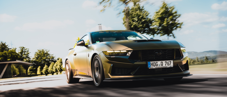 Mustang wrapped in Arlon Satin Viper Green Metallic PCC